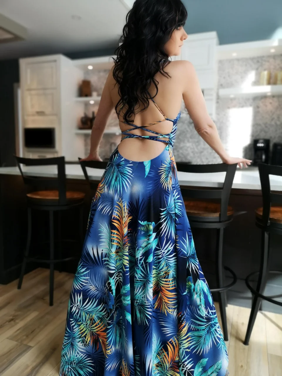 Cowl neck open back blue moonburst tropical print maxi dress.