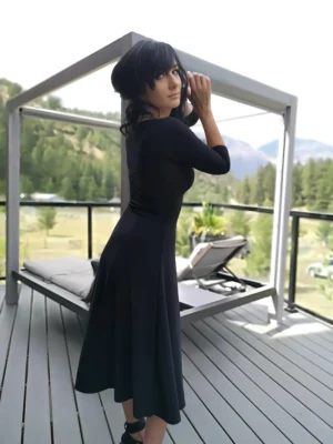 Black 3/4 sleeve mid-length dress.