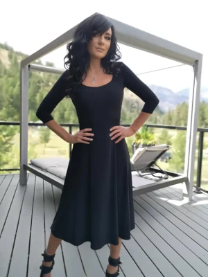 Black 3/4 sleeve mid-length dress.