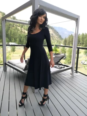 Black 3/4 sleeve mid-length dress.