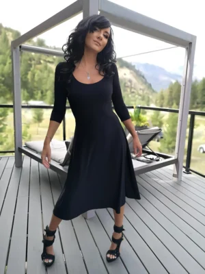 Black 3/4 sleeve mid-length dress.