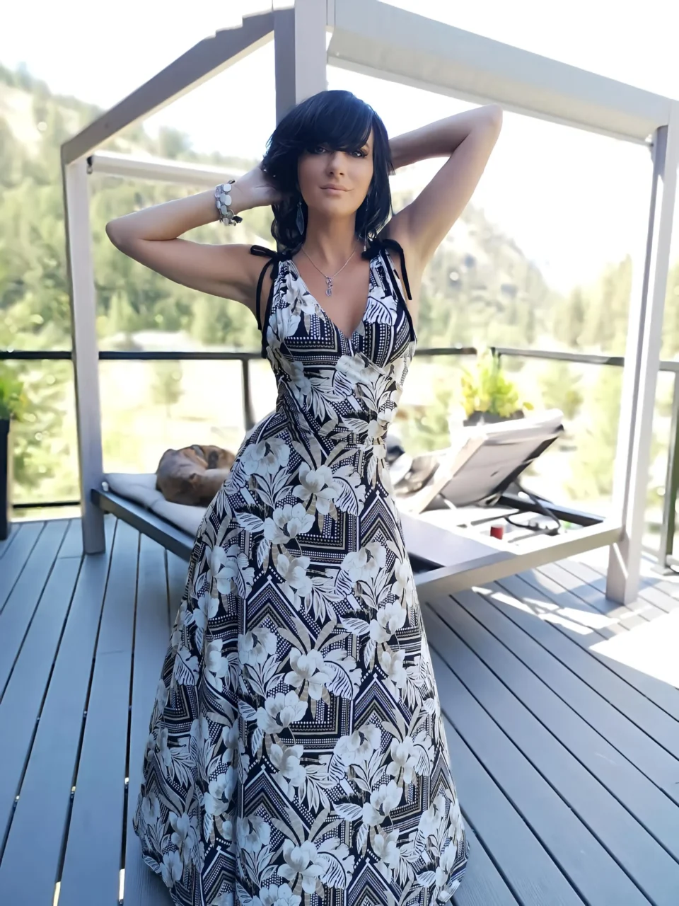 Black and white tropical print sleeveless v-neck maxi dress.