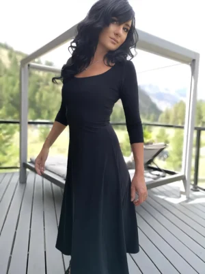 Black 3/4 sleeve mid-length dress.