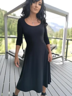 Black 3/4 sleeve mid-length dress.