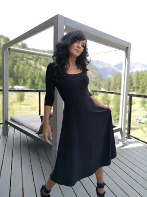Black 3/4 sleeve mid-length dress.