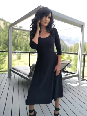 Black 3/4 sleeve mid-length dress.