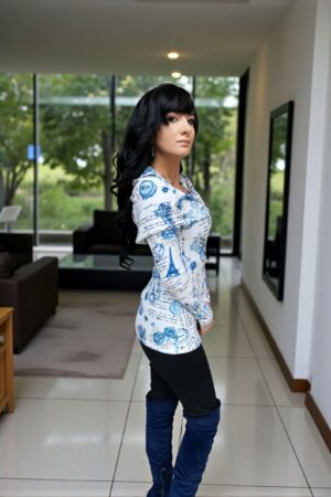 Hooded long-sleeve blue and white print tunic top with a cowl neckline or off th e shoulders look. Silky smooth with a ribbed fabric.