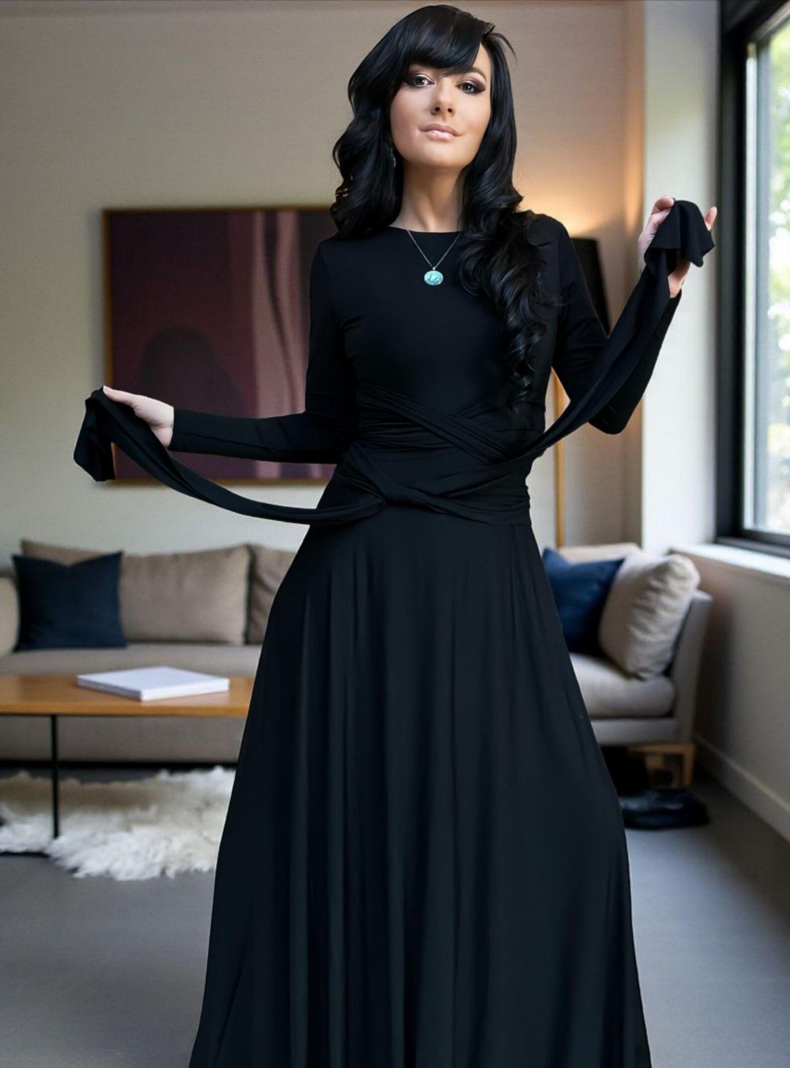 Versatile reversible black long-sleeve fitted maxi dress in bamboo/spandex, with V-neck on one side, boat neckline on the other, and two long panels that can be cinched and tied in various ways.