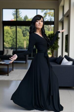 Versatile reversible black long-sleeve fitted maxi dress in bamboo/spandex, with V-neck on one side, boat neckline on the other, and two long panels that can be cinched and tied in various ways.
