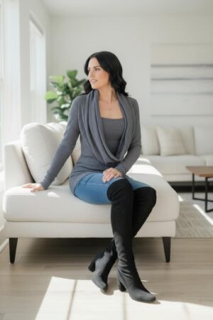 Dark gray ribbed long-sleeve sweater knit top with built-in cowl neck insert.