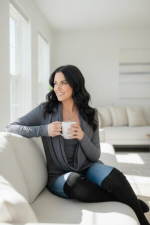 Dark gray ribbed long-sleeve sweater knit top with built-in cowl neck insert.