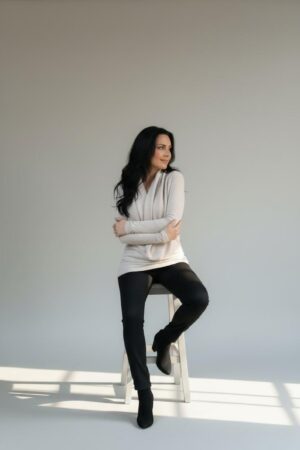 Creamy gray ribbed cowl neck long-sleeve viscose blend sweater.