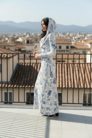 Long-sleeve hooded cowl neck white and blue Paris print maxi dress.