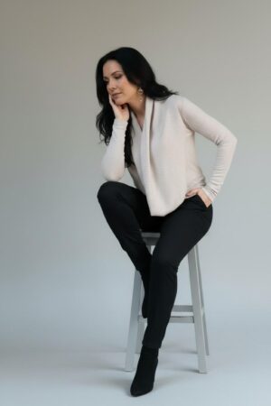 Creamy gray ribbed cowl neck long-sleeve viscose blend sweater.