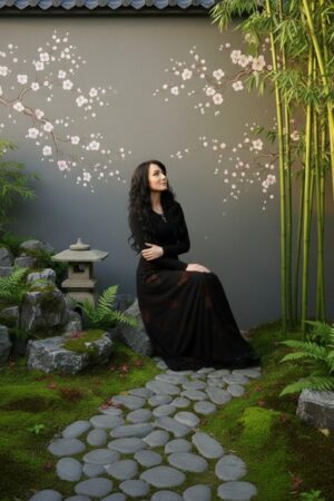 Empire waist, long-sleeve maxi dress with mesh overlay and brown floral velvet stencil atop the mesh.