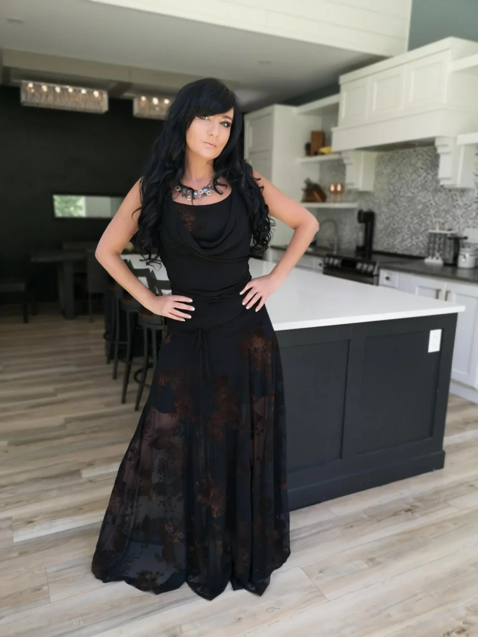 Black mesh skirt with velvet stencil.