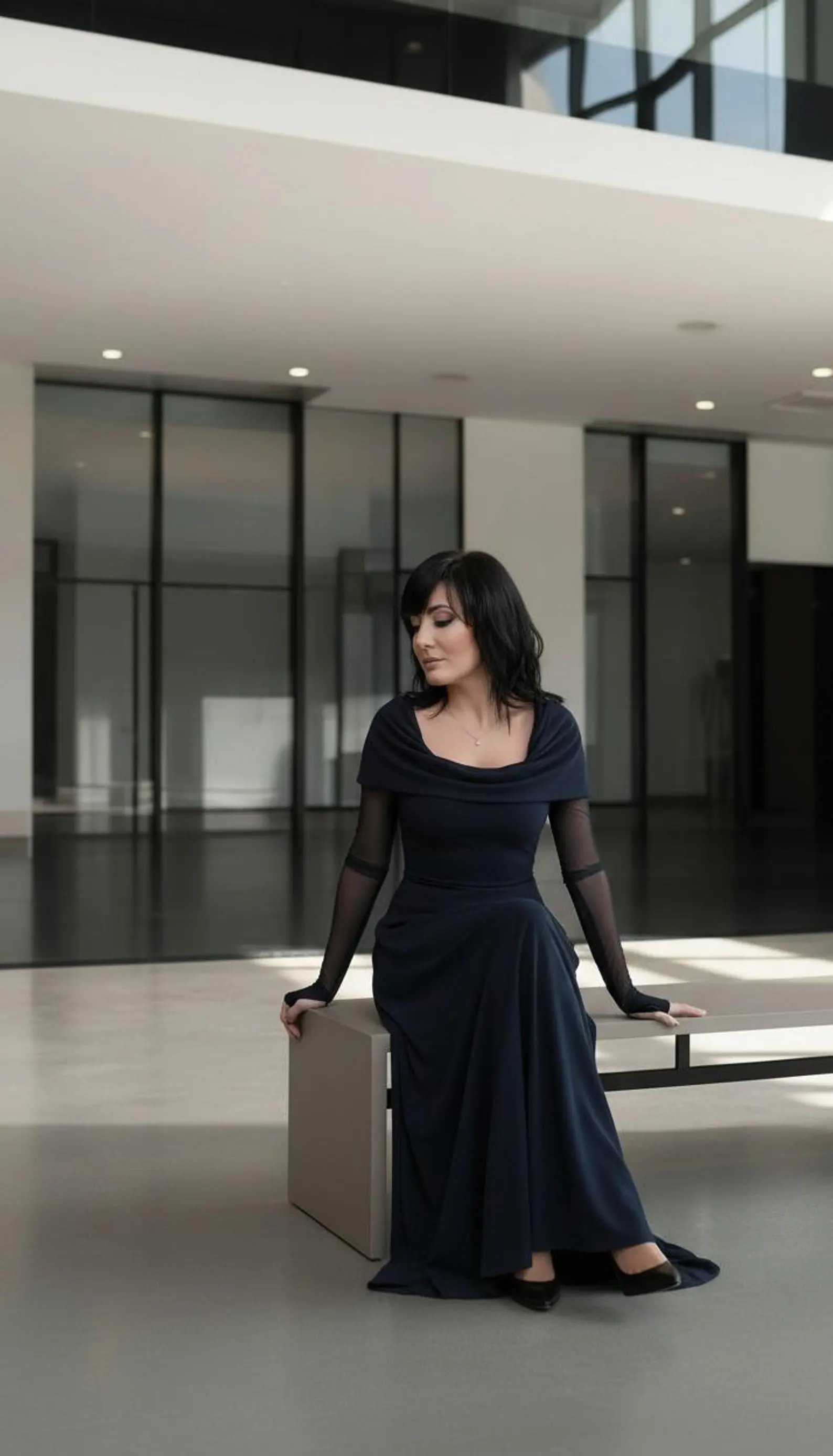 Navy blue long sleeve hooded cowl neck maxi dress.